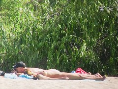 Beach nudist hunter voyeuring nude bodies from behind bushes