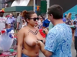 Big tits girl public body painting