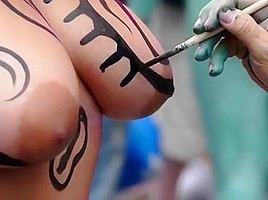 Big tits girl public body painting