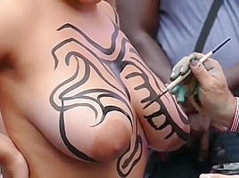 Big tits girl public body painting