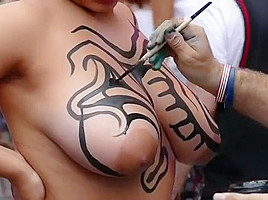 Big tits girl public body painting