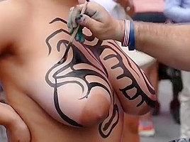 Big tits girl public body painting