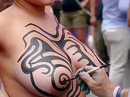 Big tits girl public body painting