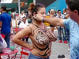 Big tits girl public body painting