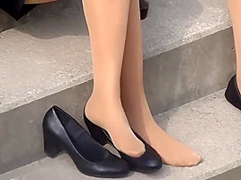 Candid of 4 pantyhosed hostesses