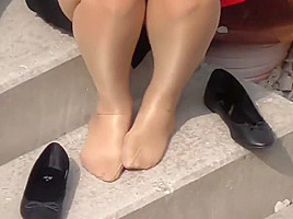 Candid of 4 pantyhosed hostesses