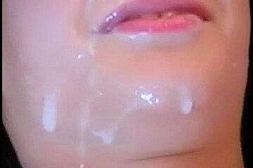 Double cumshot on a teenage cute face