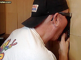Gray DILF blows and jerks hairy rod through gloryhole