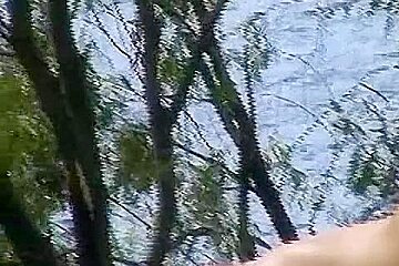 Mature lady with nice natural tits naked on beach