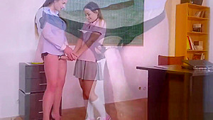 Milf Cathy fucks a teen 18+ using a dildo