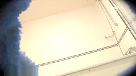 Muscly hunk showering alone