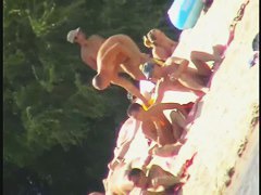 Naked tourists caught on beach relaxing and enjoying nudity