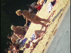 Naked tourists caught on beach relaxing and enjoying nudity