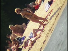 Naked tourists caught on beach relaxing and enjoying nudity