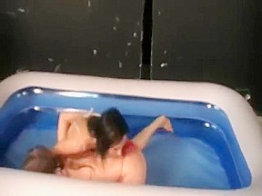 Olivia vs Monica Young girls oil wrestling