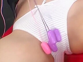 Oriental girl in white bra and panties brought to orgasm with sex toy