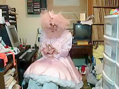 Pink Satin Sissy in chains