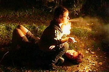 Smoking Lady Plays in the Forest