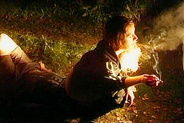 Smoking Lady Plays in the Forest