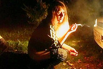 Smoking Lady Plays in the Forest