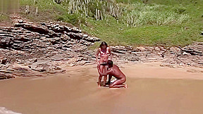 black dude eats her pussy and fucks her on the beach