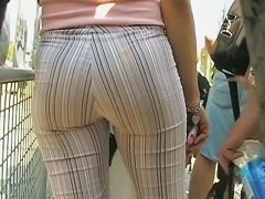 perfectly shaped ass stret candid in a seriously tight stripy trousers