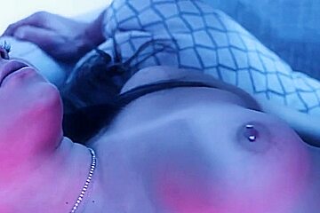 sexy blonde deepthroats a big dick in blue light